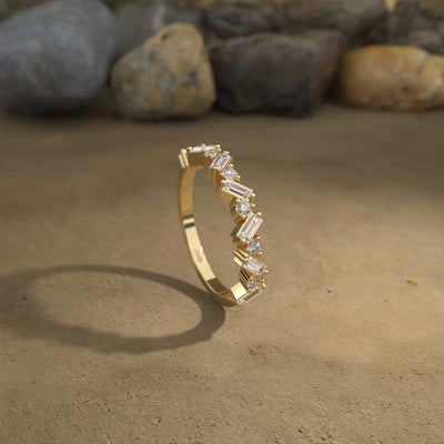 Baguette cut moissanite prong setting band in yellow gold