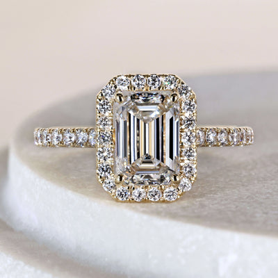 emerald cut diamond ring yellow gold pave setting