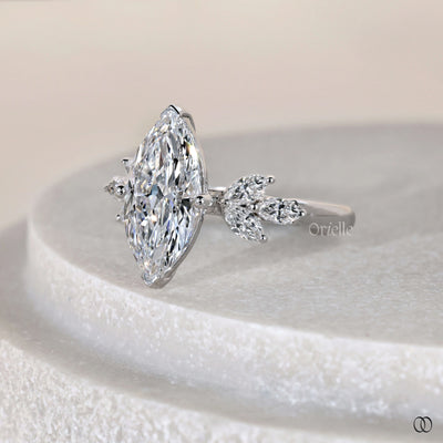 Unique engagement ring featuring marquise cut diamond
