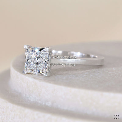 Unique engagement ring featuring princess cut diamond