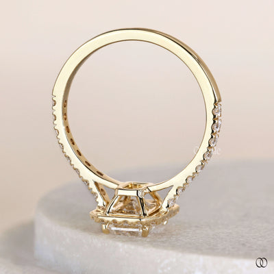 emerald cut engagement ring round prong setting
