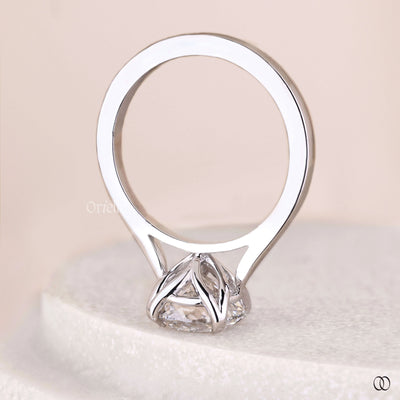 Lab grown round diamond solitaire engagement ring with claw prongs
