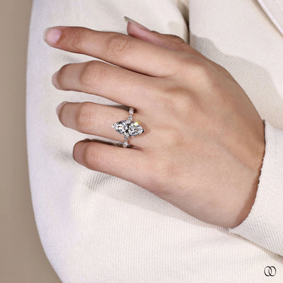 Yellow gold engagement ring for women with marquise diamond center