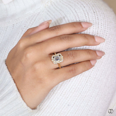 Cathedral setting emerald cut diamond ring with halo diamonds