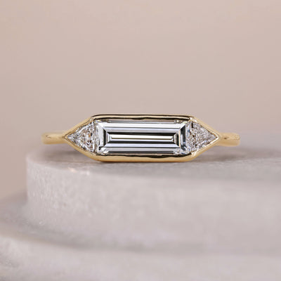 baguette diamond ring trilliant cut three stone