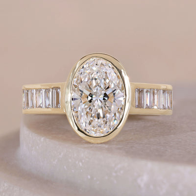 oval cut diamond engagement ring bezel set gold