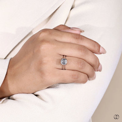 White gold round diamond solitaire ring with tulip prong setting