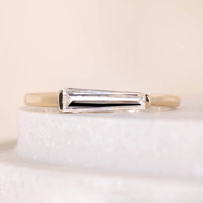 tapered baguette moissanite ring east west setting