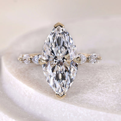 Marquise engagement diamond ring with hidden halo and V prong setting