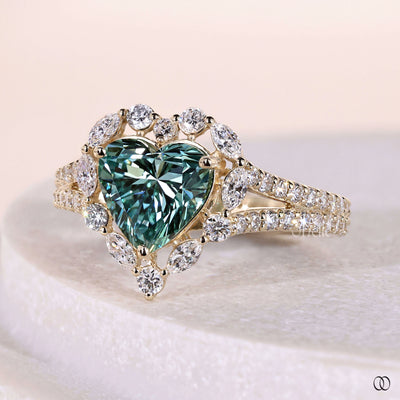 Handmade heart shaped engagement ring with split shank halo design
