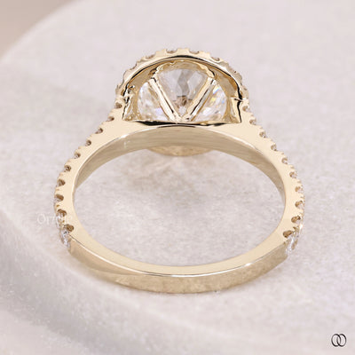 Yellow gold round diamond ring with claw prong engagement setting