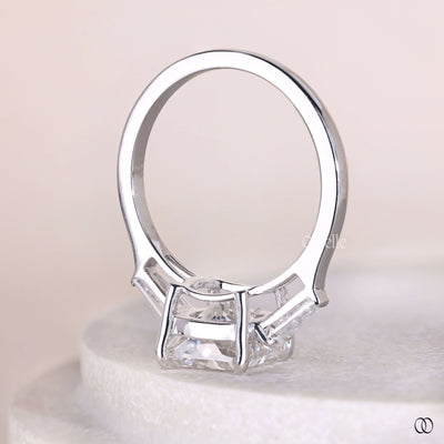 tapered baguette engagement ring cushion cut diamond
