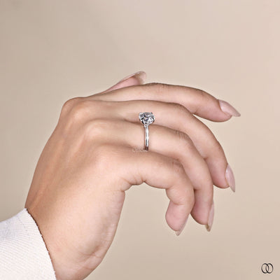 Handmade white gold round diamond engagement ring with tulip setting