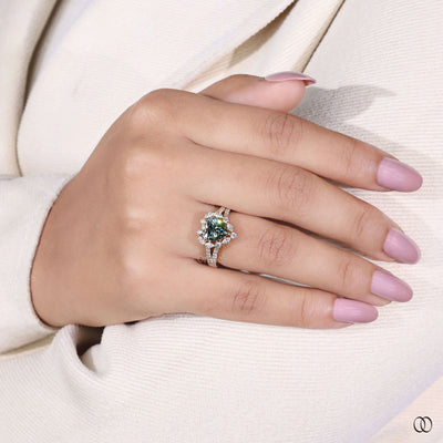 Handmade heart shaped engagement ring with round prong setting
