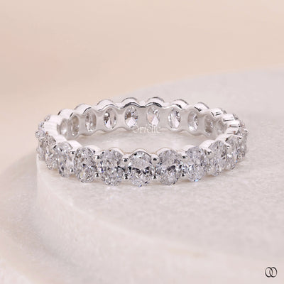 prong setting oval diamond eternity band