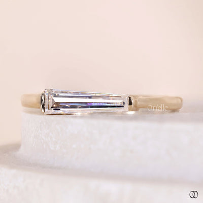 east west ring setting tapered baguette ring