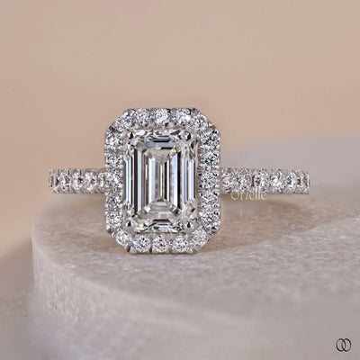 4 round prong ring emerald cut diamond