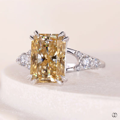 side stone engagement ring radiant cut design