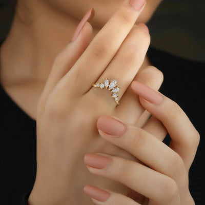 prong setting marquise and round yellow gold wedding band