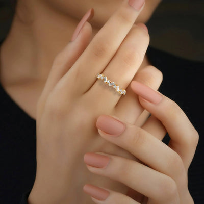 Handmade half eternity band with round and baguette moissanite