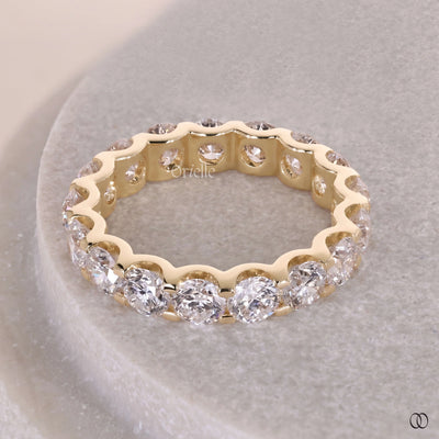 Full eternity style wedding band with continuous diamond details