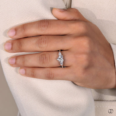 pear cut side stone ring heart diamond design