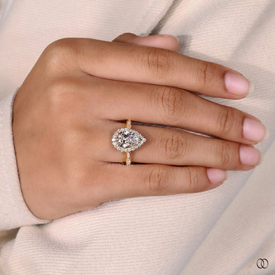 halo ring setting pear shaped diamond ring