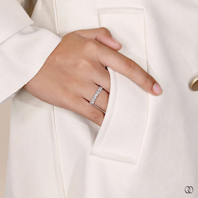 oval diamond band shared prong setting