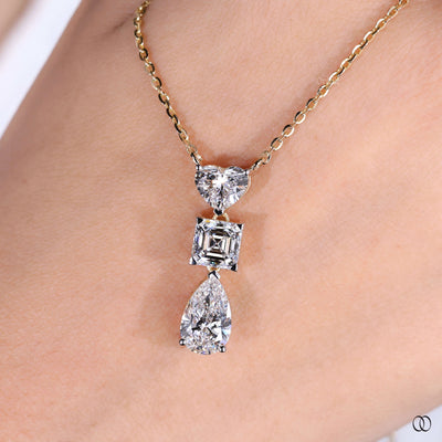 delicate yellow gold heart diamond pendant design