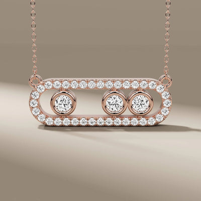 Shared prong 3 stone diamond pendant in gold setting