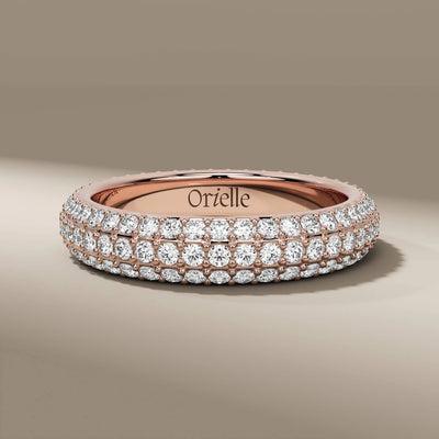 Dainty stacking wedding band with round diamonds in prong setting