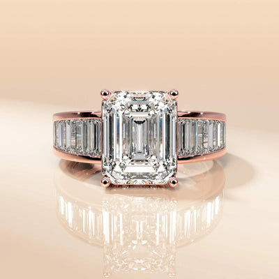 Pave engagement ring with an emerald cut center stone
