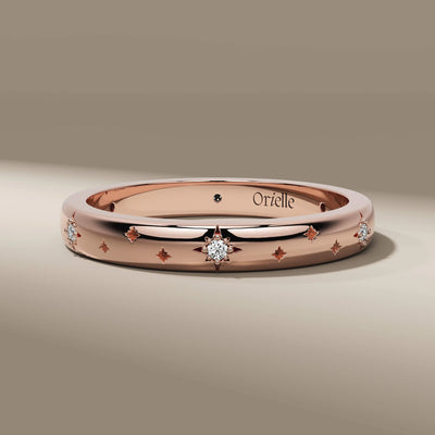 yellow gold wedding band with starburst diamond accents