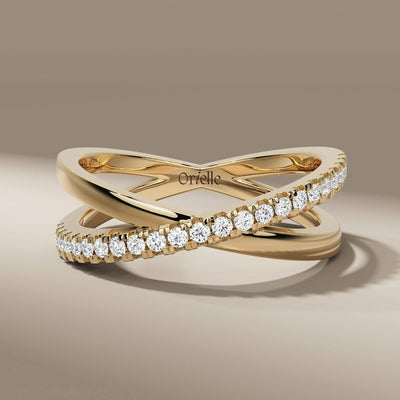 round moissanite band in yellow gold with crossover infinity style