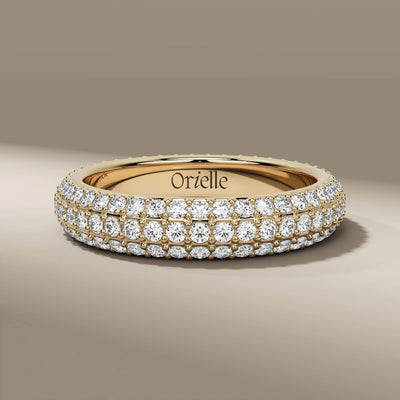 Three row pave diamond band in yellow gold with prong setting style