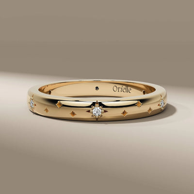starburst wedding band in yellow gold with round diamonds