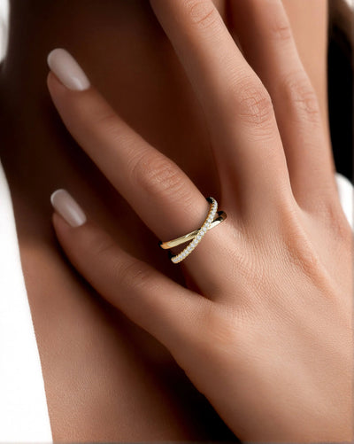 unique design band in yellow gold with infinity style setting