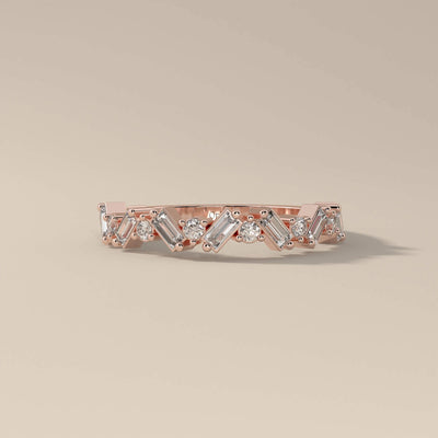 Unique prong set wedding band with baguette and round moissanite