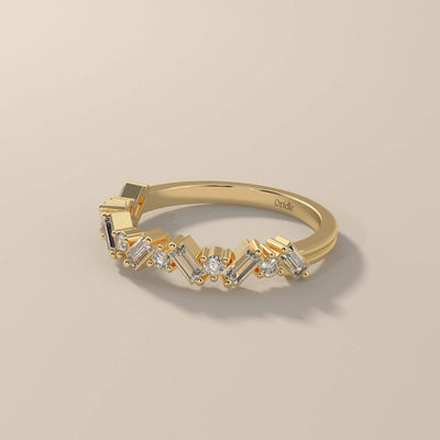 Round moissanite promise band in a designer half eternity style