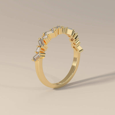 Round cut moissanite half eternity band in yellow gold setting