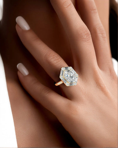 Yellow gold hexagon moissanite ring with baguette halo stones