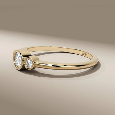 round diamond wedding band in sleek bezel setting design