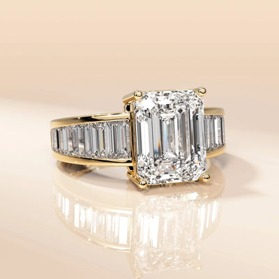 Handmade emerald cut ring featuring baguette side stones