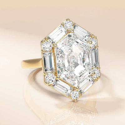 Hexagon moissanite ring with round and baguette cut halo design