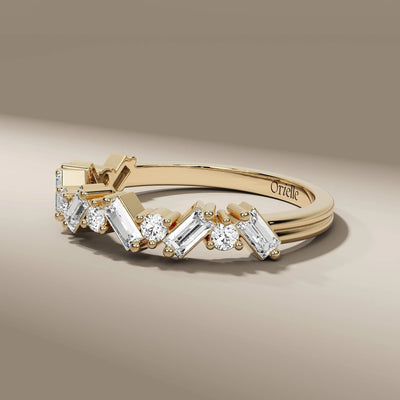 Baguette and round cut diamond band in elegant prong setting