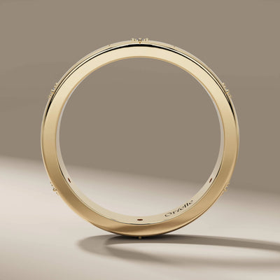 round cut diamond band in elegant yellow gold design