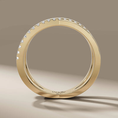 yellow gold crossover band with round moissanite sparkle