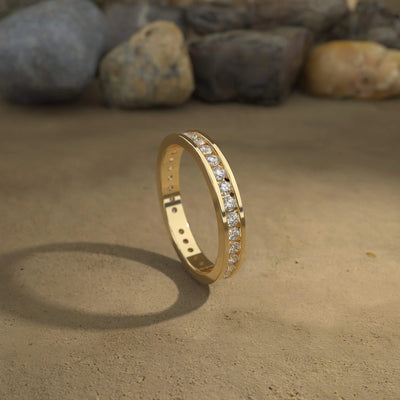 handmade channel set round diamond wedding band

