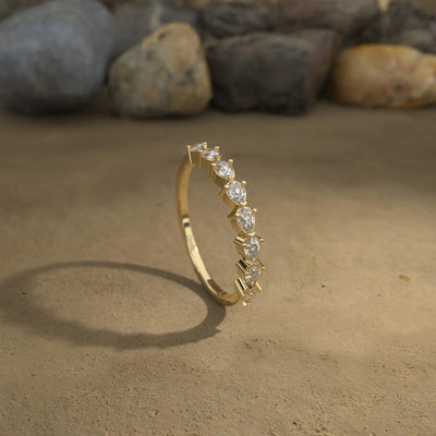 moissanite promise pear half eternity wedding band
