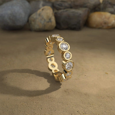 designer bezel set round moissanite wedding band
